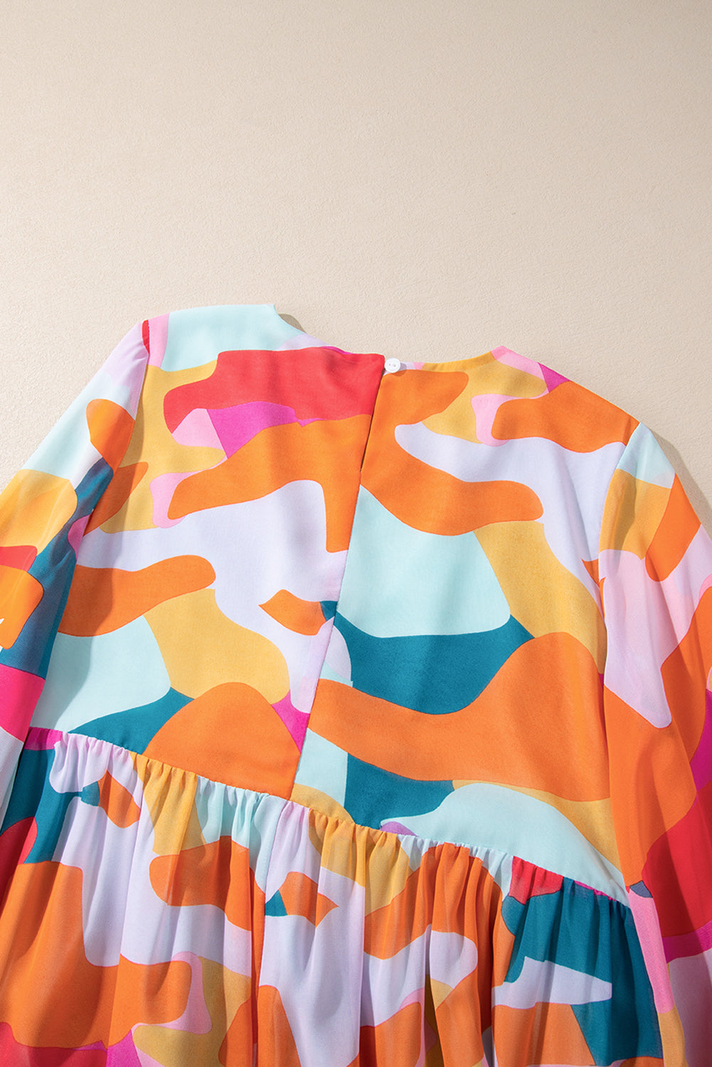 Effortless Laura Long Sleeve Mini Dress with Ruffle Hem and Color Block V Neck Statement Occasion Edit