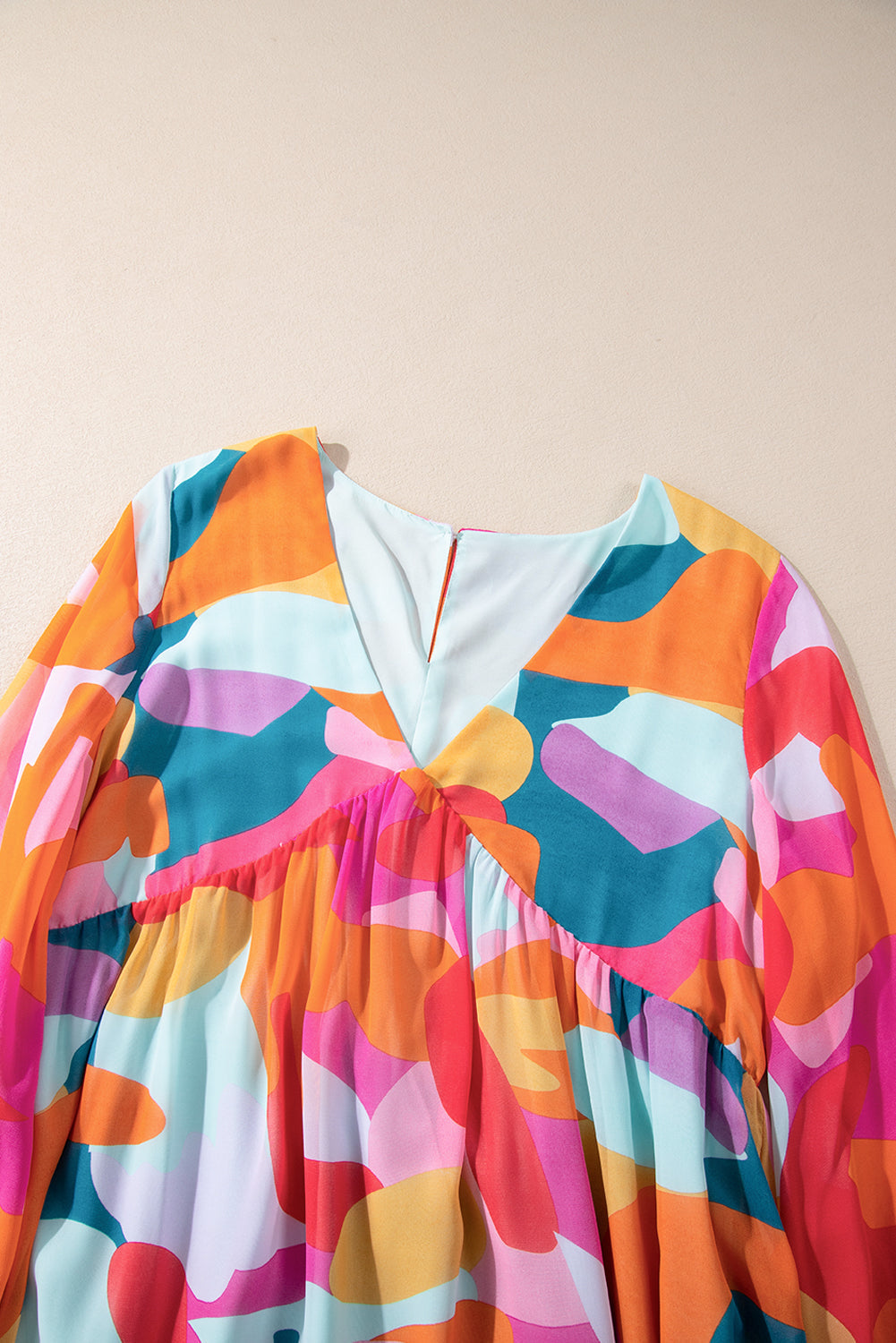 Effortless Laura Long Sleeve Mini Dress with Ruffle Hem and Color Block V Neck Statement Occasion Edit