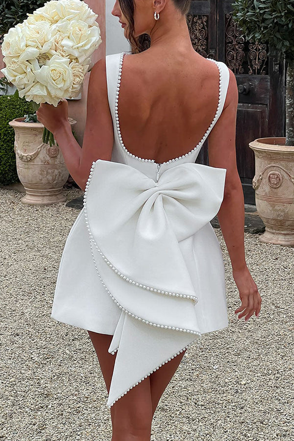 Lillian Effortless Stylish Tailored Fit Mini Dress with a Large Bow and Beaded Detailing Chic Silhouette Collection