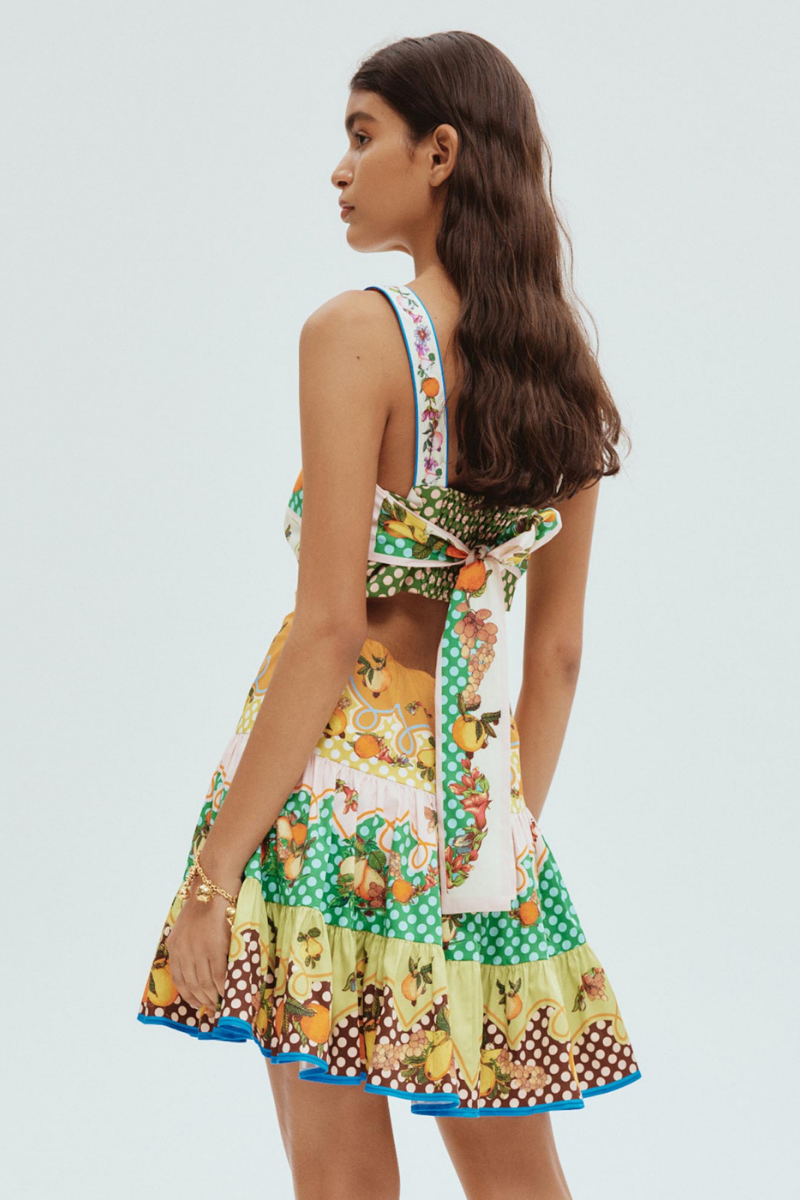 Timeless Silvia Mini Dress with Cut Outs and Bow Boutique Collection