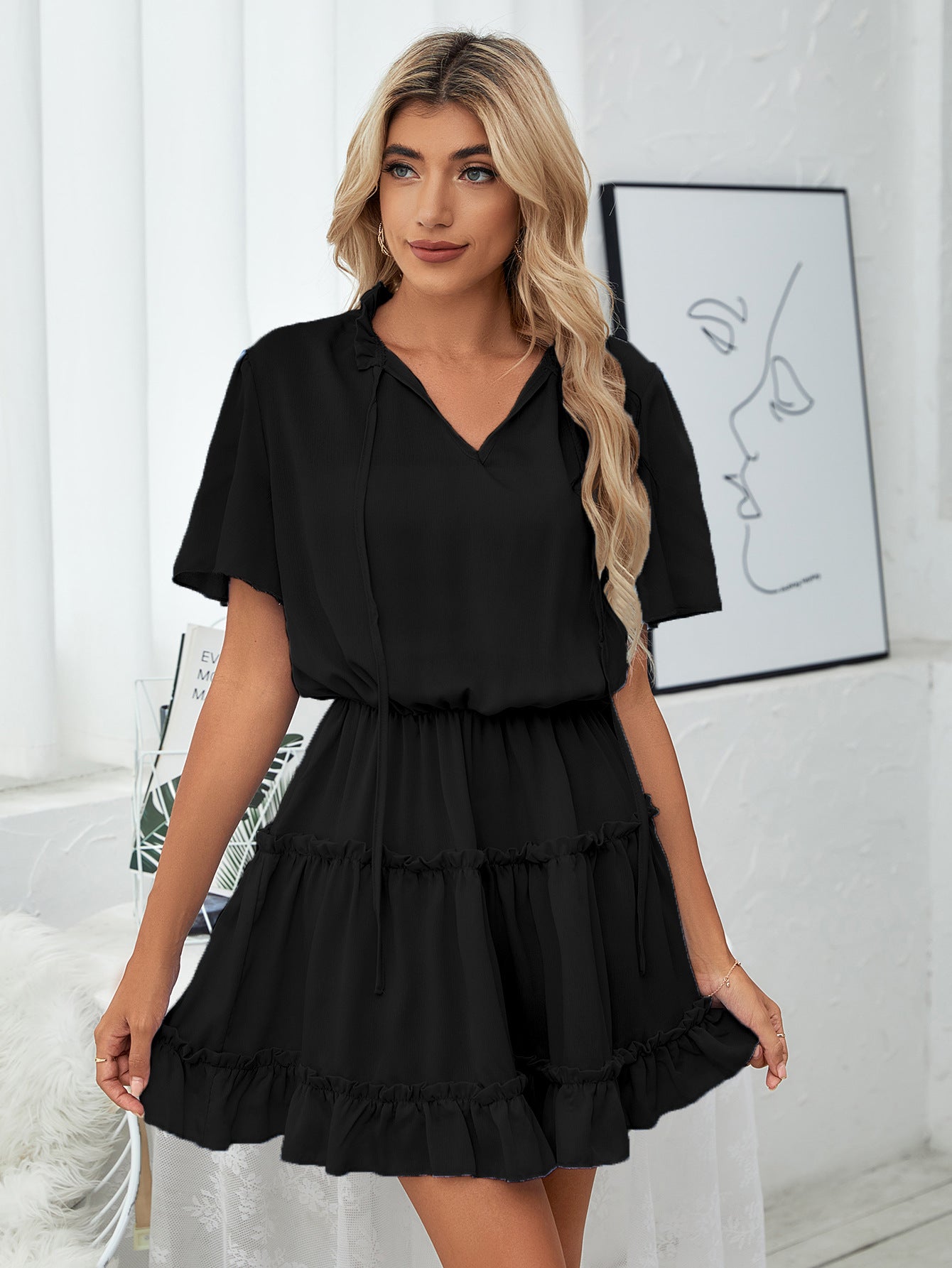 It Slow Down Smocked Tassel Dress Black