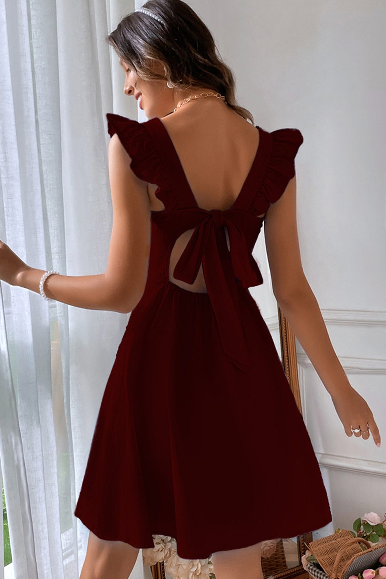 Sleeveless Ruffle Tie-back Mini Dress