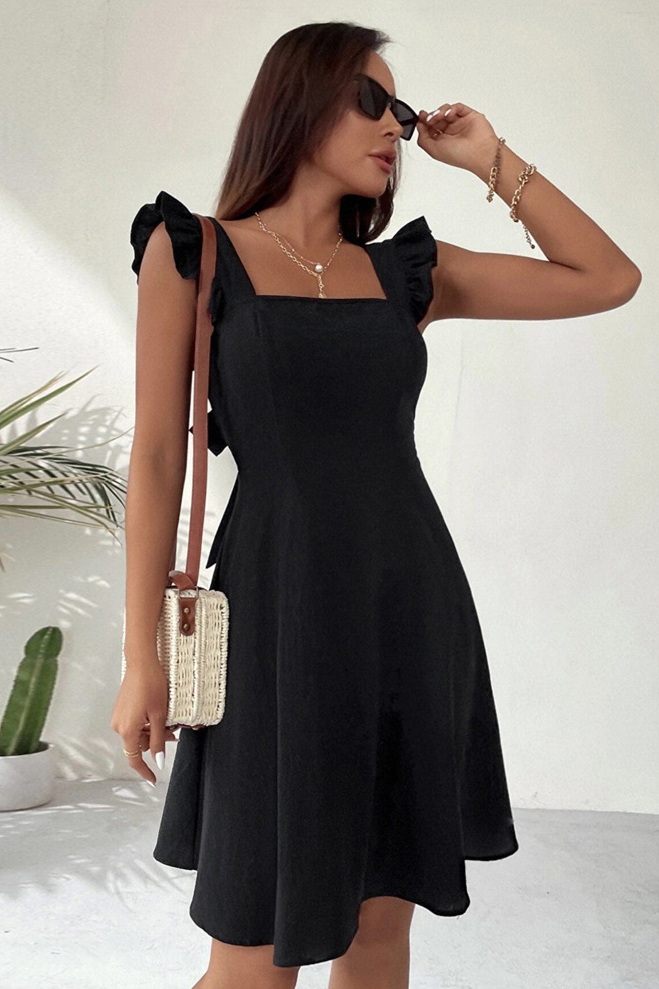 Sleeveless Ruffle Tie-back Mini Dress