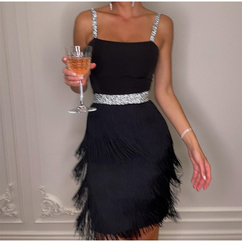 Kissnovaa - Off Shoulder Suspender Fringed Slim Dress