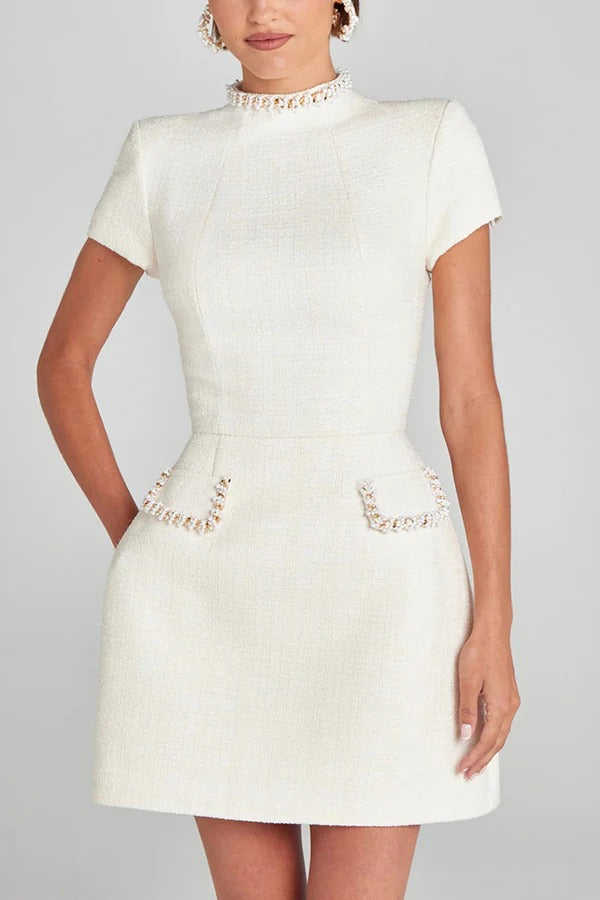 Timeless Leslie Exquisite and Playful Mini Dress Made of Tweed Fabric with Beaded Trim, Short Sleeves and Pockets Elevated Occasion Wear