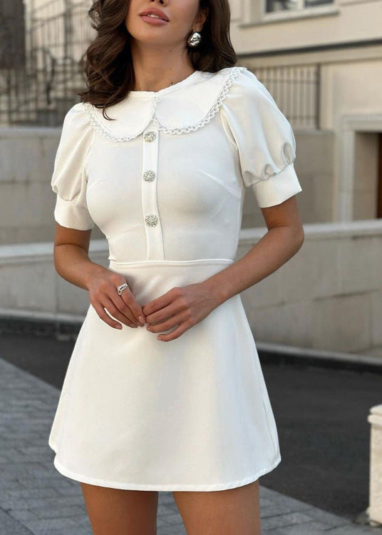 - Eloise Pearl Button Puff Sleeve Mini Dress