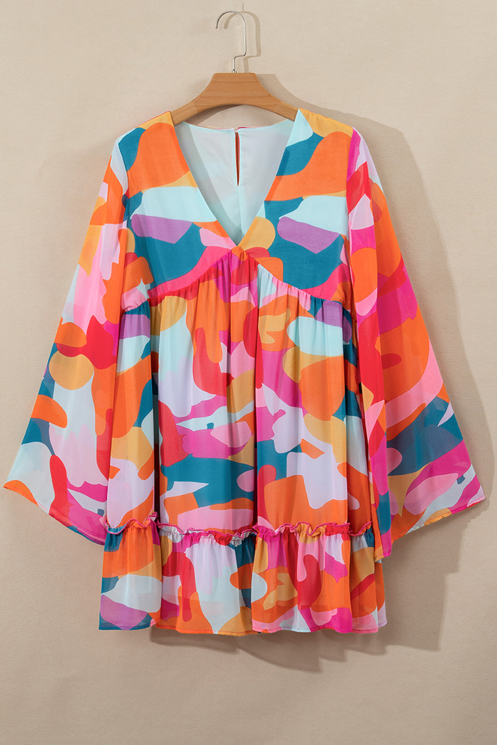 Effortless Laura Long Sleeve Mini Dress with Ruffle Hem and Color Block V Neck Statement Occasion Edit