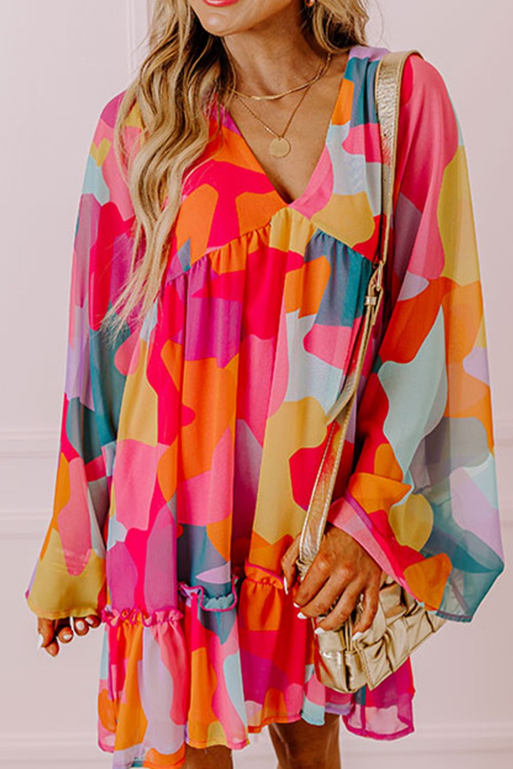 Effortless Laura Long Sleeve Mini Dress with Ruffle Hem and Color Block V Neck Statement Occasion Edit