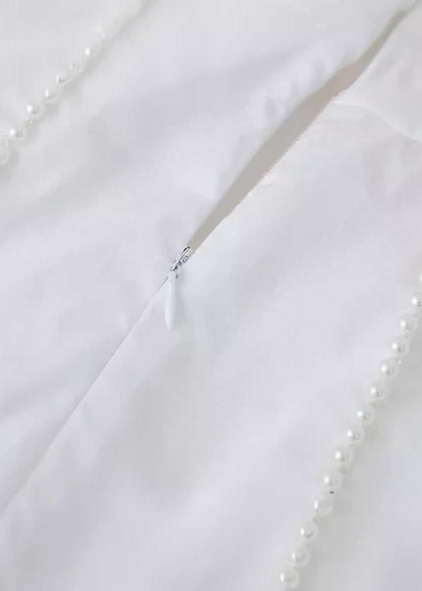 - Rosalie Halter Neck Mini Dress with Pearl Details