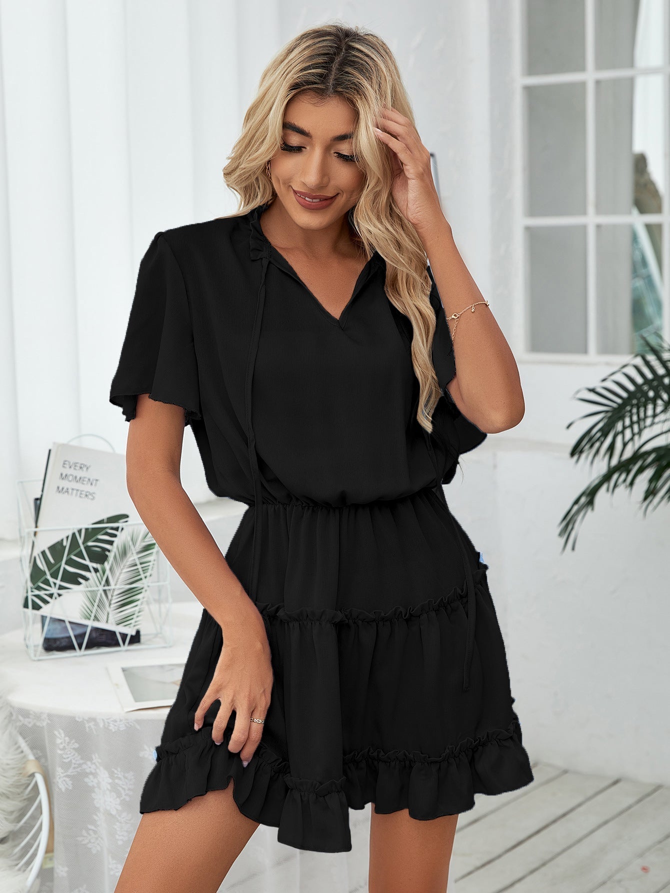 It Slow Down Smocked Tassel Dress Black