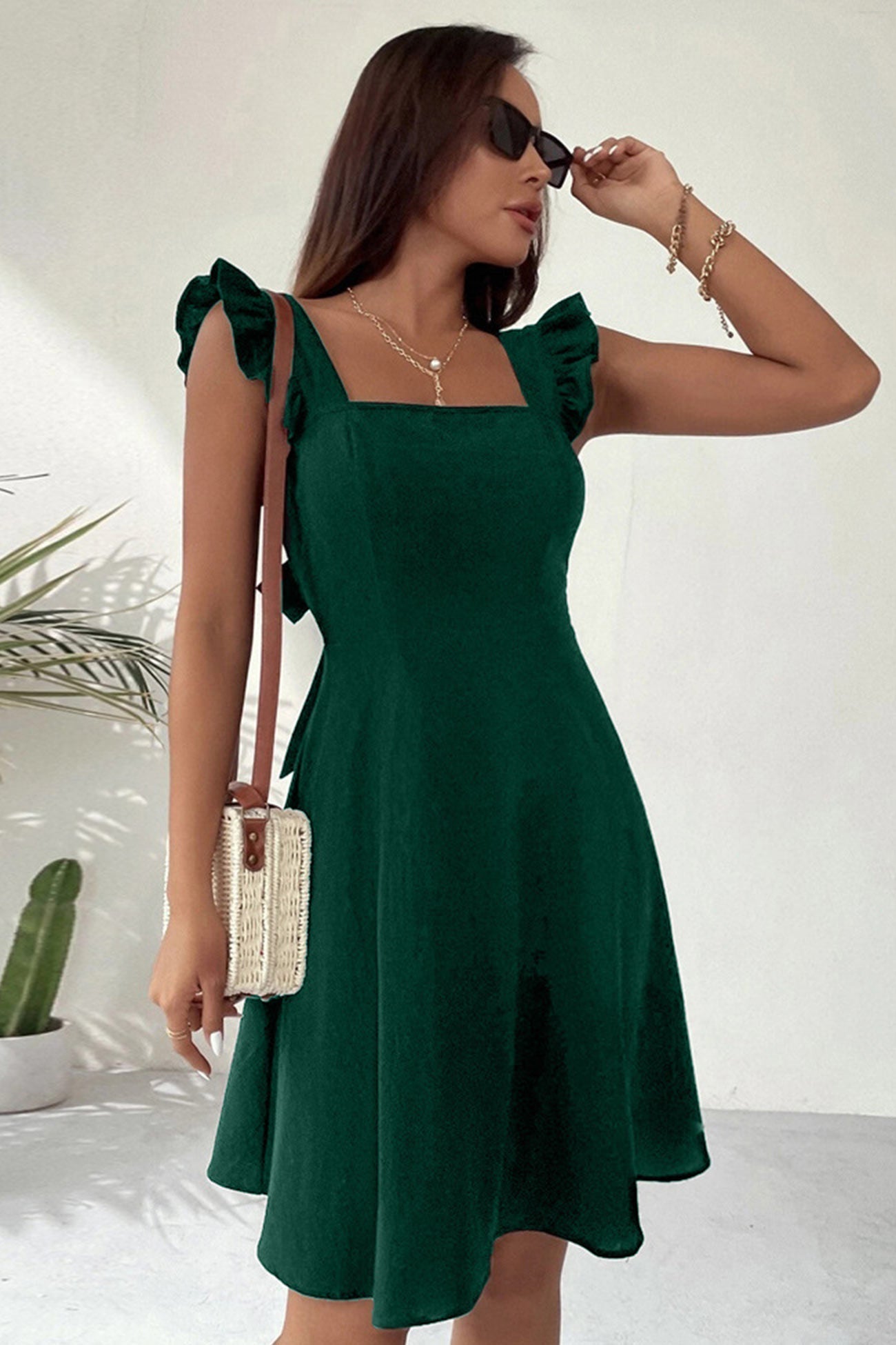 Sleeveless Ruffle Tie-back Mini Dress