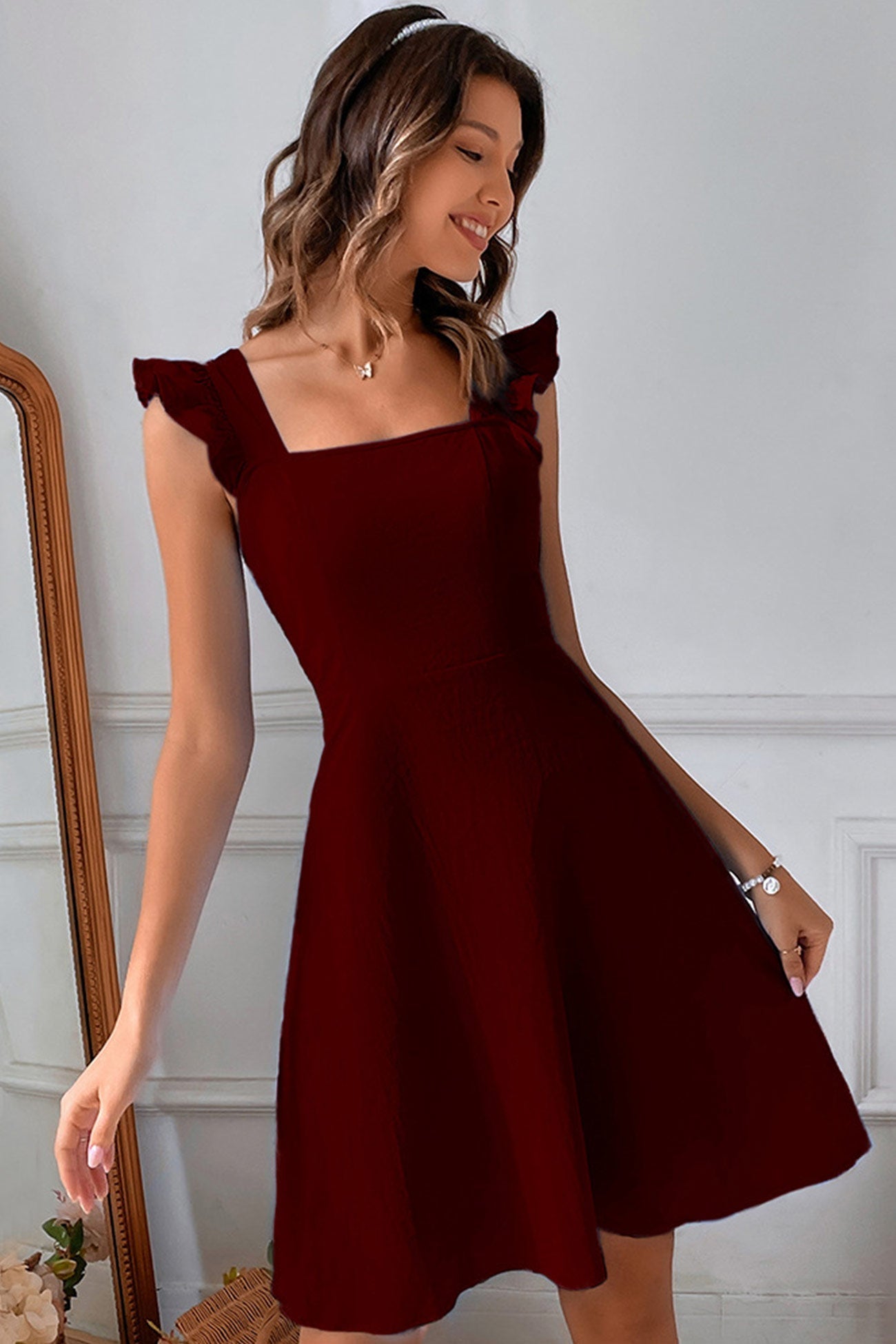 Sleeveless Ruffle Tie-back Mini Dress